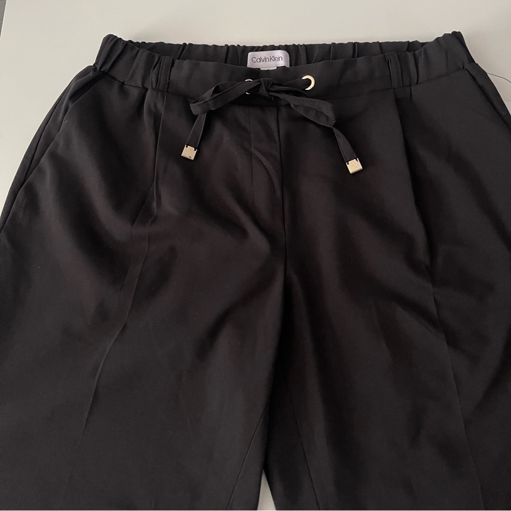 Cropped black Calvin Klein trousers